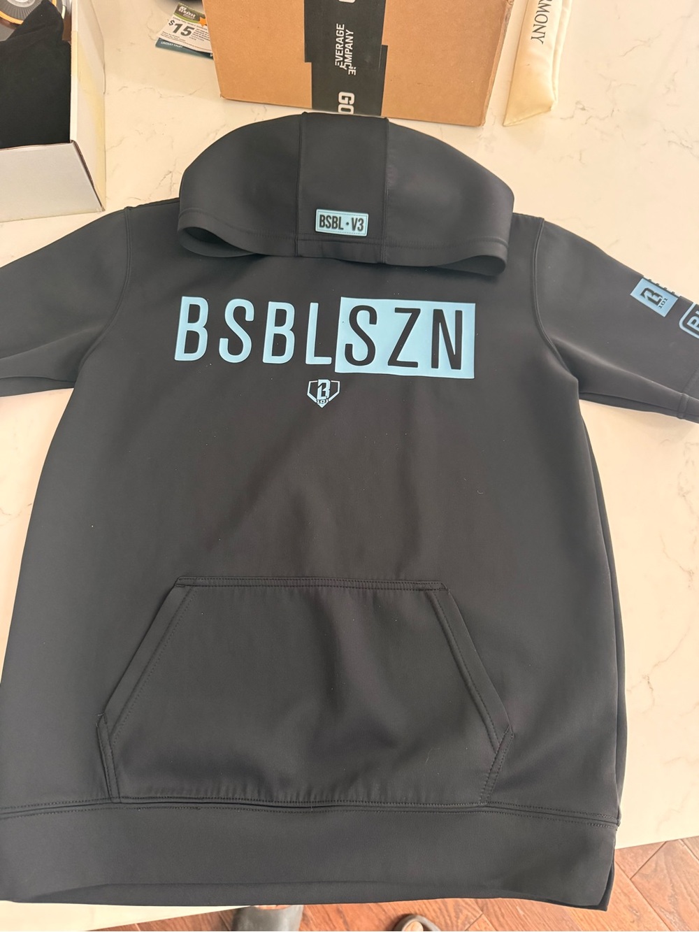 Baseball lifestyle BSBL SZN Kids Black Short Sleeve Tee with Blue Logo-size YL